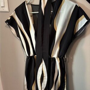 Chic Black and White Dress with Gold Accents